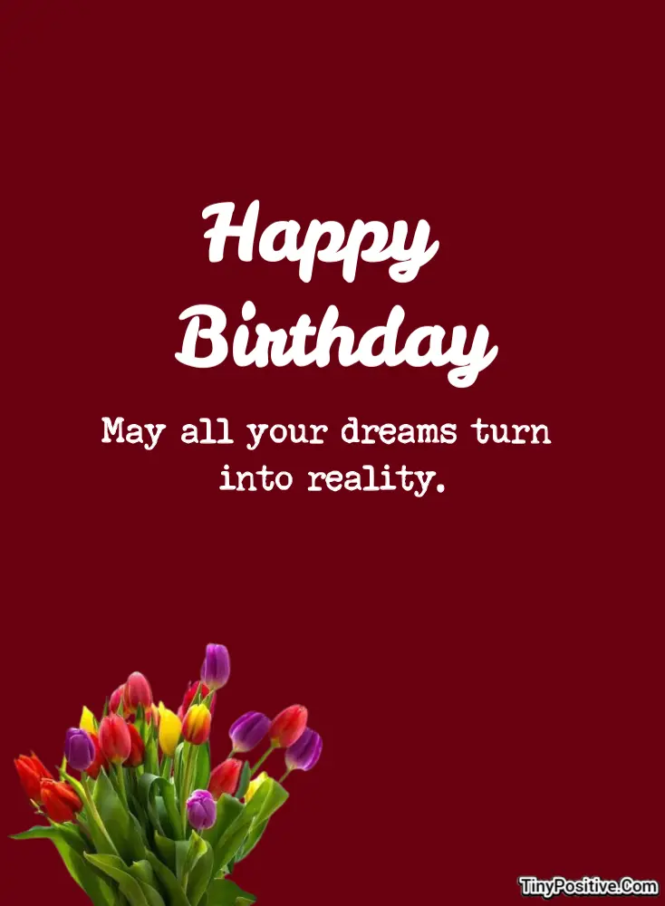 A birthday card reading 'Happy Birthday May all your dreams turn into reality.' on a deep burgundy background with a bouquet of colorful tulips.