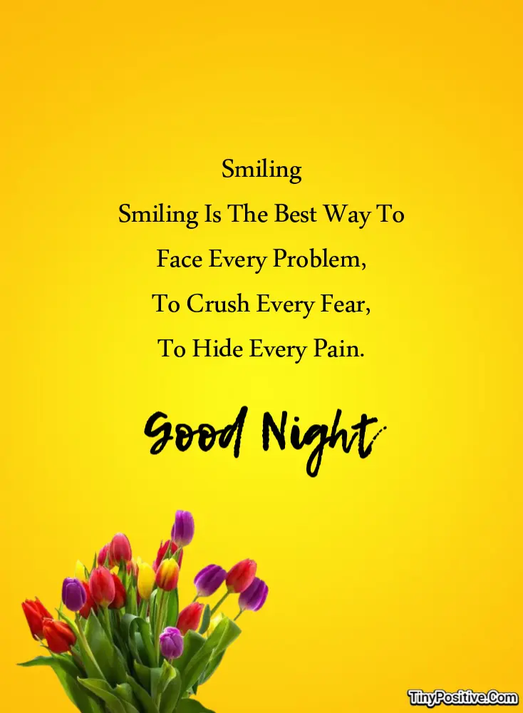 An inspirational good night quote card reading 'Smiling Smiling Is The Best Way To Face Every Problem, To Crush Every Fear, To Hide Every Pain. Good Night' set against a bright yellow background with a bouquet of colorful tulips.